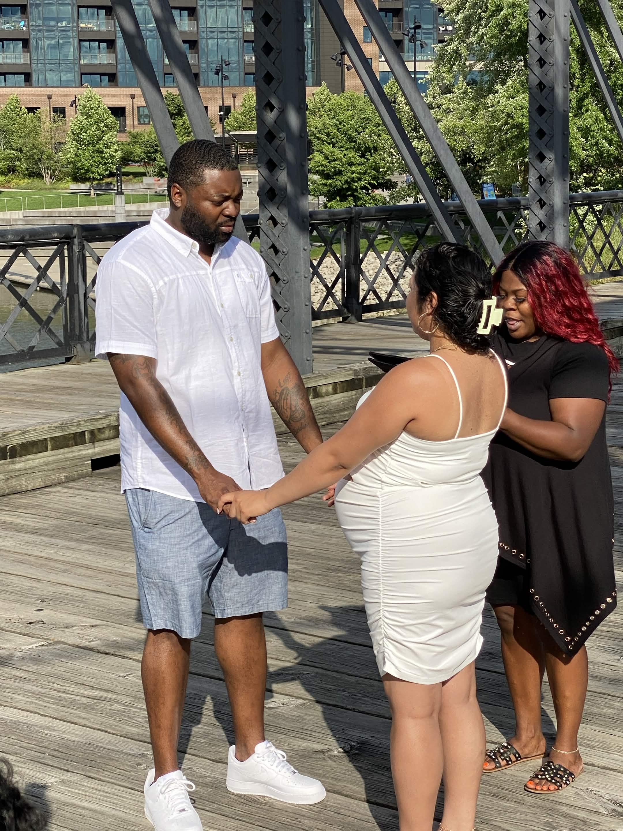 A ceremony on a riverfront bridge